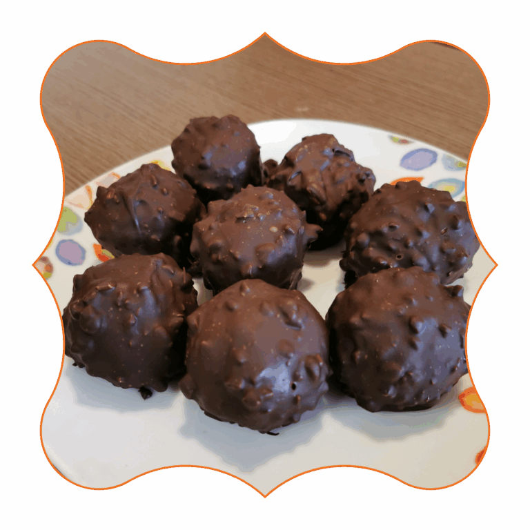Tartufi al cioccolato fondente con granella croccante serviti su piatto decorato – dolci pasquali da riciclo facili e veloci