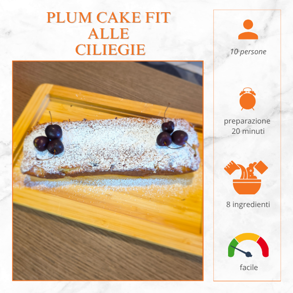 Plum cake fit con ciliegie fresche e spolverata di zucchero a velo su tagliere in legno